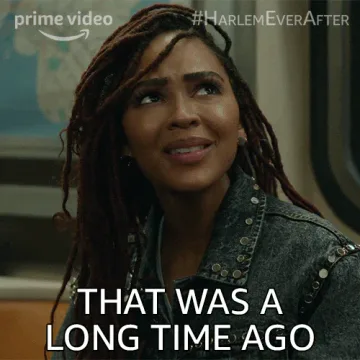 Meagan+Good+Long+Time+GIF+by+Harlem.gif A woman with long locs looks up wistfully as on-screen text reads 'That was a long time ago.'