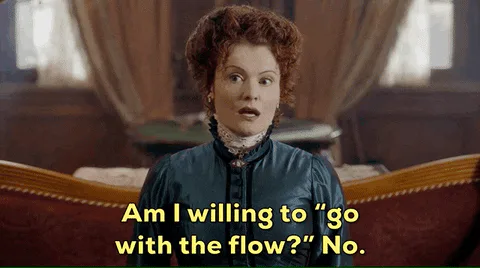 A woman in Victorian dress says 'Am I willing to go with the flow? No.'