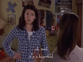 season+1+netflix+GIF+by+Gilmore+Girls.gif A woman says 'Oh, twirl, it's a hair twirl' to someone with their back turned.