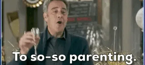 c8547b78-e2f4-6901-4a9a-3edf2667d10f.gif A man raises a champagne glass and toasts 'To so-so parenting.'