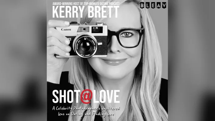 Black and white artwork for Shot at Love showing Kerry Brett holding a camera.