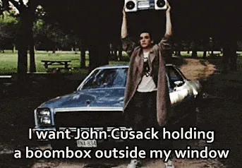 ezgif.com-gif-maker+(1).gif A movie still of a man raising a boombox is captioned 'I want John Cusack holding a boombox outside my window.'