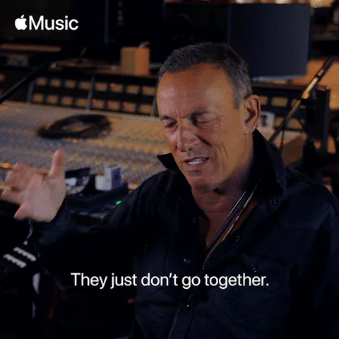 A man in a recording studio gestures while talking and says 'They just don't go together.'