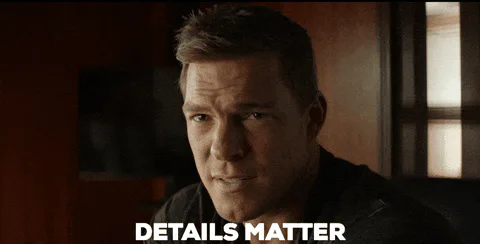 A man in a dim room says 'Details matter.'