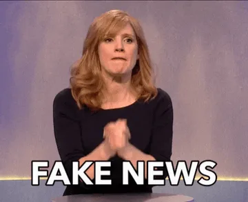 Fake+News+GIF+by+MOODMAN.gif A red haired woman claps her hands together, captioned 'Fake news.'