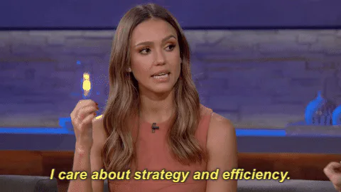 A woman with wavy hair says 'I care about strategy and efficiency' while gesturing with a small object.
