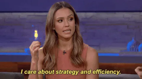 jessica+alba+GIF+by+Chelsea+Handler.gif A woman with wavy hair says 'I care about strategy and efficiency' while gesturing with a small object.