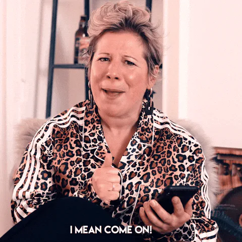A woman in a leopard print top holds a phone and gestures, captioned 'I mean come on! Where's your commitment?!'