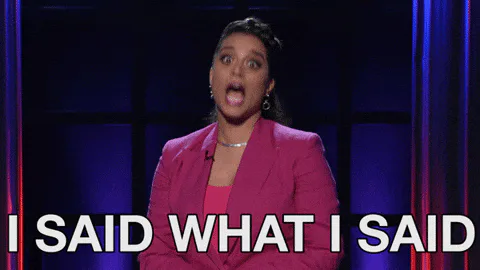 A woman in a pink blazer speaks emphatically, captioned 'I said what I said.'