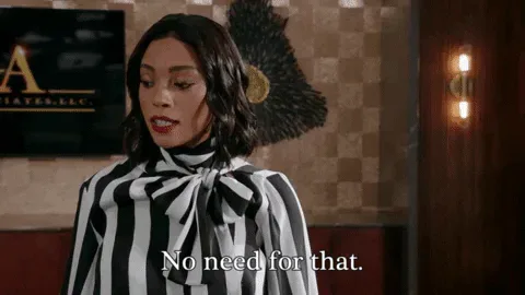 1a1a53de-5941-82a5-fd7a-6c5d0d29cc3e.gif A woman in a black and white striped top says 'No need for that.'