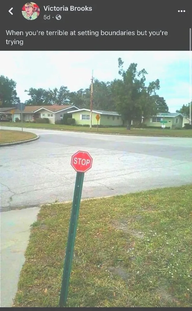 A street photo of a stop sign captioned 'When you're terrible at setting boundaries but you're trying.'