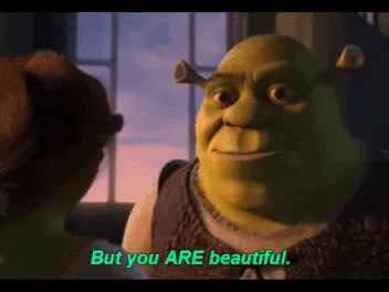 _.gif An animated ogre smiles at a woman and says 'But you ARE beautiful.'