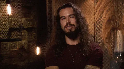 Too+Much+Bachelor+Nation+GIF+by+The+Bachelor.gif A long-haired, bearded man in a dimly lit bar says, 'Too much, too hard, too soon, too fast.'