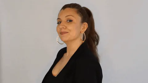 A woman with a high ponytail and hoop earrings smiles and nods, then the word 'Yup!' appears.