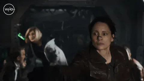 7823a47a-0279-767c-3f76-252b238ff976.gif A woman on a spaceship urgently says 'Abort the mission.'