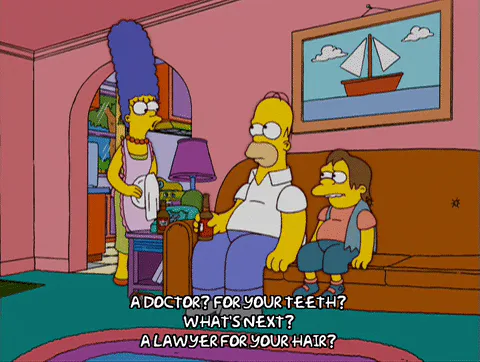 Animated family in a living room, with dialogue joking 'A doctor for your teeth? What's next, a lawyer for your hair?'