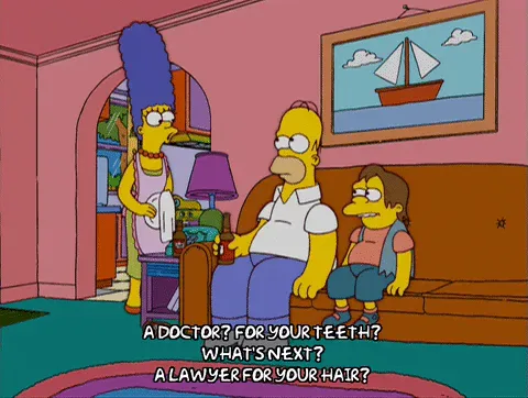 7e66c2dd-d5a5-e089-3155-35f3fb953419.gif Animated family in a living room, with dialogue joking 'A doctor for your teeth? What's next, a lawyer for your hair?'