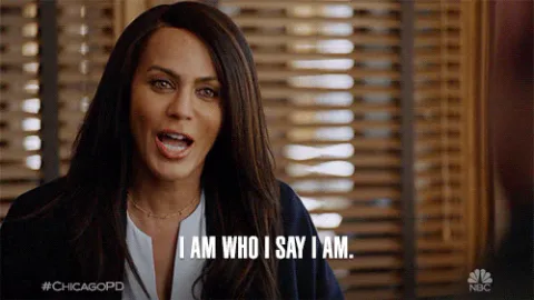 4281ef75-479b-36ec-5c76-30c53e993bd8.gif A woman with dark hair in an office says 'I am who I say I am.'
