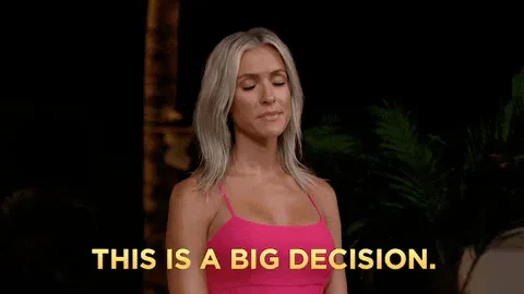 Decide+Fox+Tv+GIF+by+Paradise+Hotel.gif A blonde woman in a pink top looks pensive and says 'This is a big decision.'