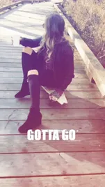See+Ya+Reaction+GIF+by+Lauren+Jenkins.gif A blonde woman in a black outfit sits on a wooden boardwalk holding a coffee cup, captioned 'Gotta go.'