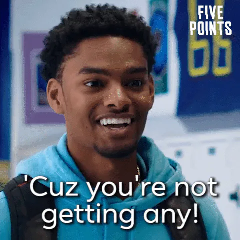 A young man in a blue hoodie reacts with wide eyes and says 'Cuz you're not getting any!'