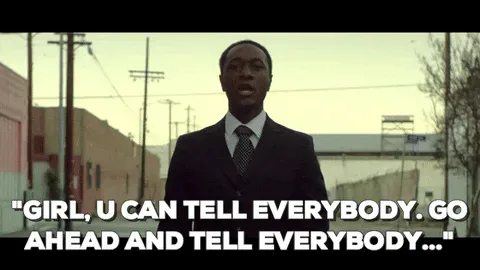 e61767e9-a01b-d013-9be0-d18504a7dc57.gif A man in a suit walks down an alley and says 'Girl, u can tell everybody. Go ahead and tell everybody...'