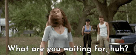what-are-you-waiting-for.gif A young woman throws her arms wide and shouts in a grassy yard, two people and a parked car behind her, captioned "What are you waiting for, huh?"