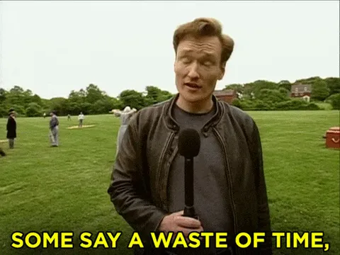 Old+Timey+Baseball+Waiting+GIF+by+Team+Coco+(1).gif A man holds a microphone on a lawn and says 'Some say a waste of time, others say an incredible waste of time.'