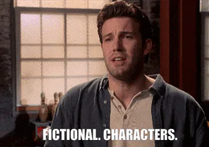 A man gestures while saying 'Fictional. Characters.' in front of a window.