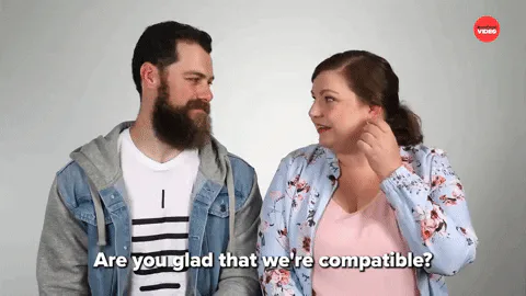 A bearded man and a woman smile as she says 'But now the stars say we are as well.'