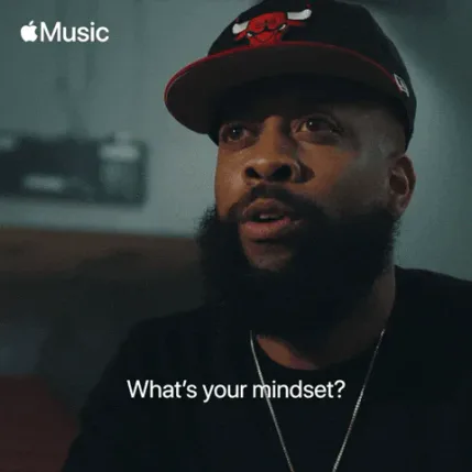 What+You+Thinking+Rap+Life+GIF+by+Apple+Music.gif A bearded man in a Chicago Bulls cap gestures while saying 'What's your mindset?' in an Apple Music interview.