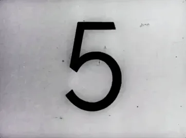 0c573678-7a30-3513-6d23-211cea5cb78f.gif Black-and-white film countdown leader, numbers 5 to 2, ending in a black frame.