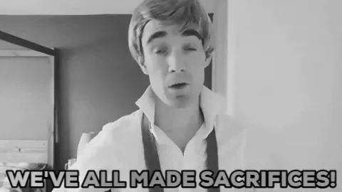 A man in suspenders speaks earnestly in black and white as text reads 'We've all made sacrifices!'