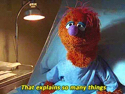 Puppet+Scrubs+GIF.gif A furry orange puppet under a lamp says 'That explains so many things.'