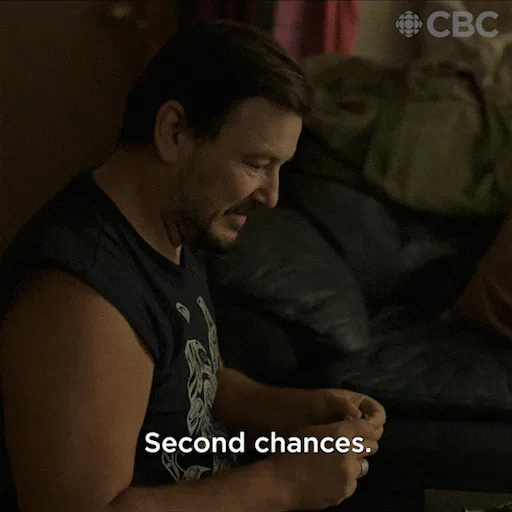 A bearded man on a couch says 'Second chances. Everybody needs 'em.'