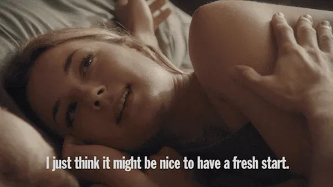A woman lying in bed says, “I just think it might be nice to have a fresh start.”