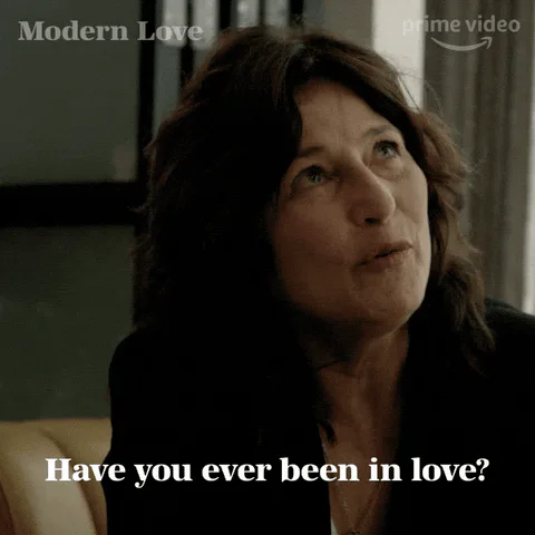A woman looks up thoughtfully and asks 'Have you ever been in love?'