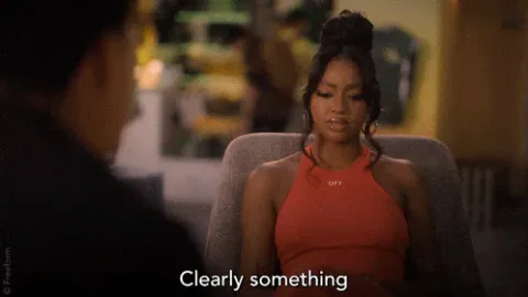 Reflecting+Season+6+GIF+by+grown-ish.gif A woman in a red halter top sits across a table from a man and says, 'Clearly something between us is broken.'