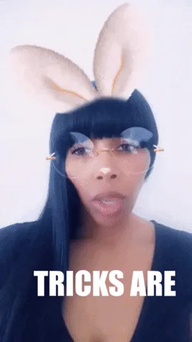 A woman wearing bunny ears and glasses says 'Tricks are 4 kids!'